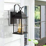1 light industrial glass wall sconce with black and gold finish