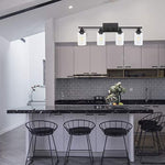 4 light black industrial wall light fixture with clear glass shade