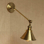 Divito 1-Light Armed Sconce with brass finish