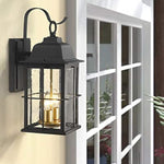 1 light industrial glass wall sconce with black and gold finish