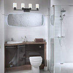 4 light black industrial wall light fixture with clear glass shade