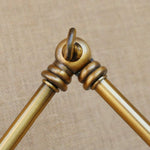 Divito 1-Light Armed Sconce with brass finish