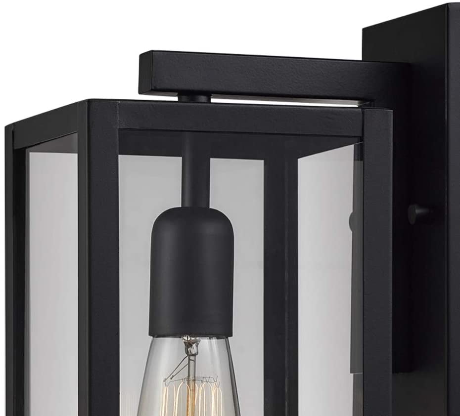 Single black wall sconce with glass shade