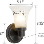 Single glass wall light with bronze finish
