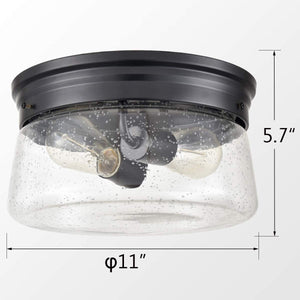 Black flush mount ceiling light fixture with seeded glass shade
