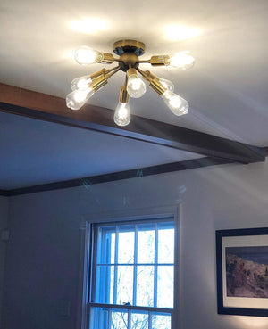 8 light antique sputnik ceiling light with brass finish