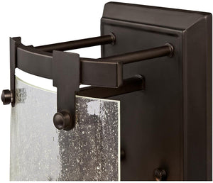 1 light indoor rubbed bronze wall sconce with clear seeded glass