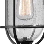 Single black wall light with glass shade